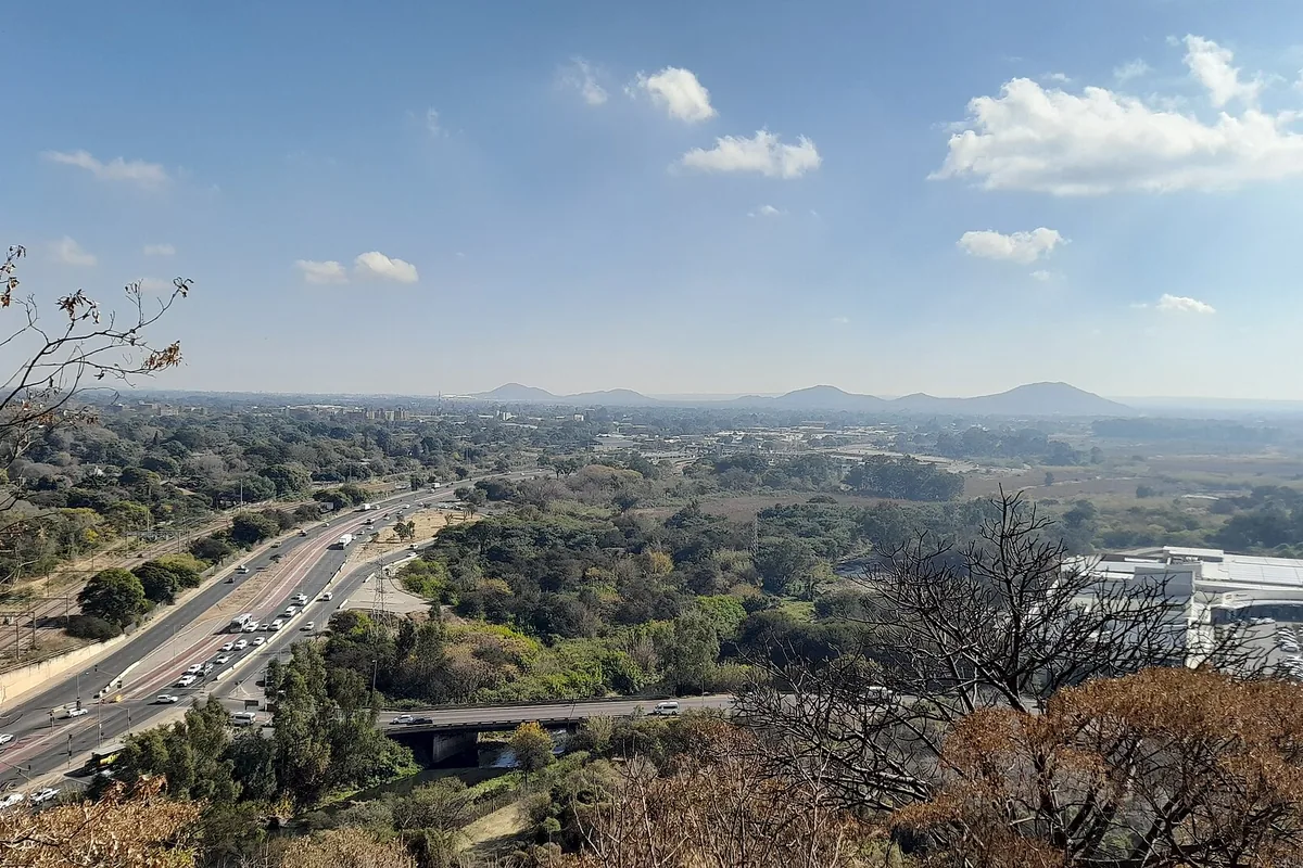 Elevated view across Pretoria North and the Magaliesberg landscape