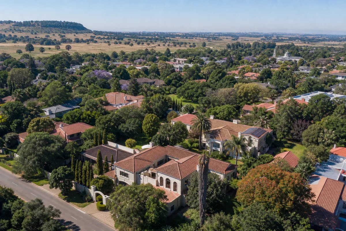 Leafy established homes and open Highveld landscape in Erasmia, within HoneySucker's Pretoria West septic service coverage
